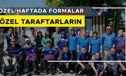 ÖZEL BİREYLERE KIRMIZI LACİVERTLİ FORMA HEDİYE EDİLDİ