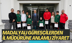 MADALYALI GÜREŞÇİLERDEN İL MÜDÜRÜNE ANLAMLI ZİYARET