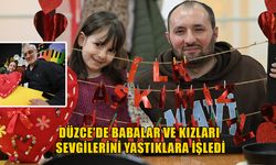 DİKİŞ YAPAN BABALAR RENKLİ GÖRÜNTÜ OLUŞTURDU