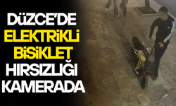 DÜKKANIN ÖNÜNDEN ÇALDI, ARKASINA BAKA BAKA UZAKLAŞTI