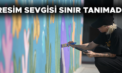 YAŞADIĞI MAHALLEYİ RENGARENK YAPTI