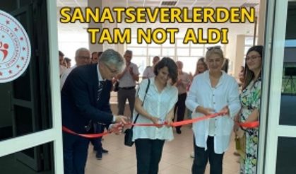 AÇILIŞ KURDELESİNİ YANMAZ KESTİ