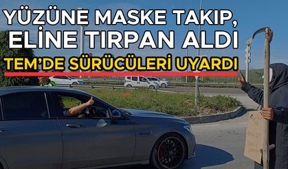 YÜZÜNE MASKE TAKIP, ELİNE TIRPAN ALDI