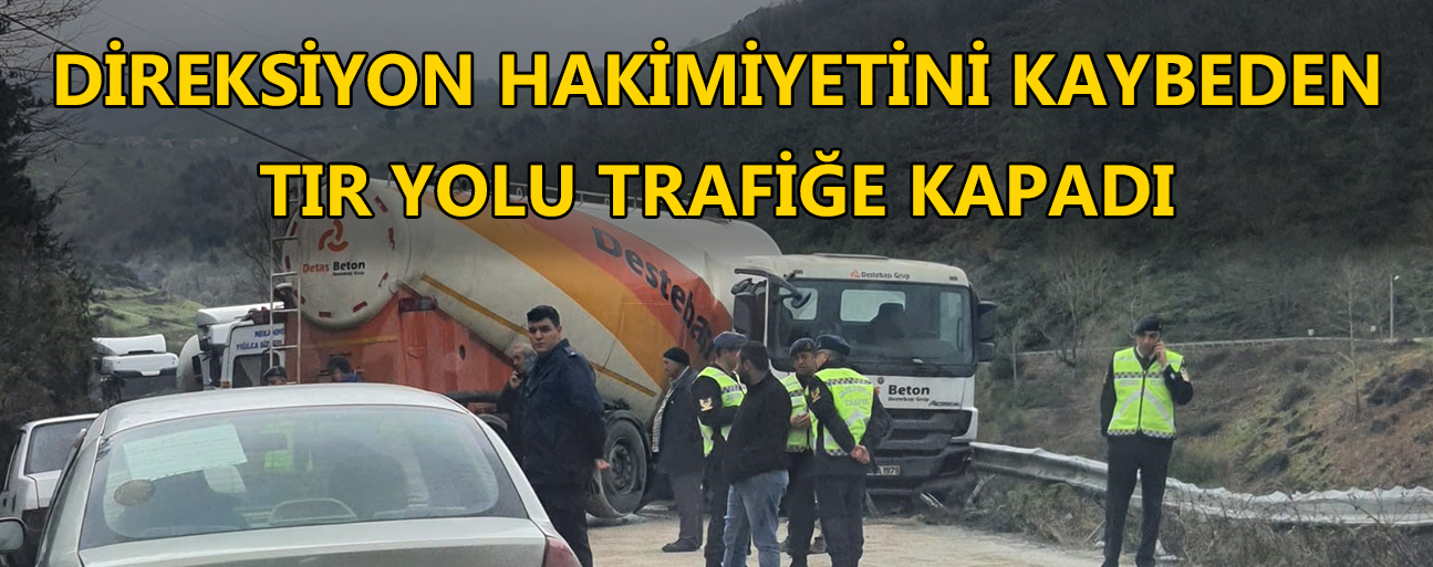 ÇEKİCİ YARDIMIYLA YOL KISMEN AÇILDI